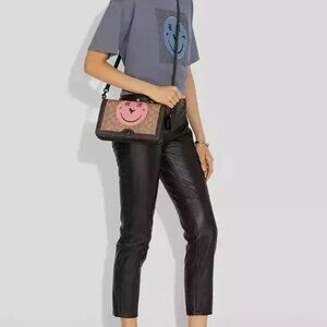 Pre Owned Coach Riley In Signature Canvas W/ Rexy By Yeti Out Crossbody